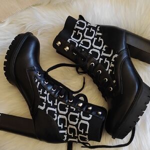 NWOT. Guess Black and White Lace Up Boots